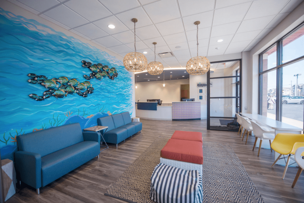 Potomac Pediatric Dentistry - Family Dentistry and Orthodontics Angled shot of the waiting room of Woodbridge pediatric dentist and orthodontist Potomac Pediatric Dentistry